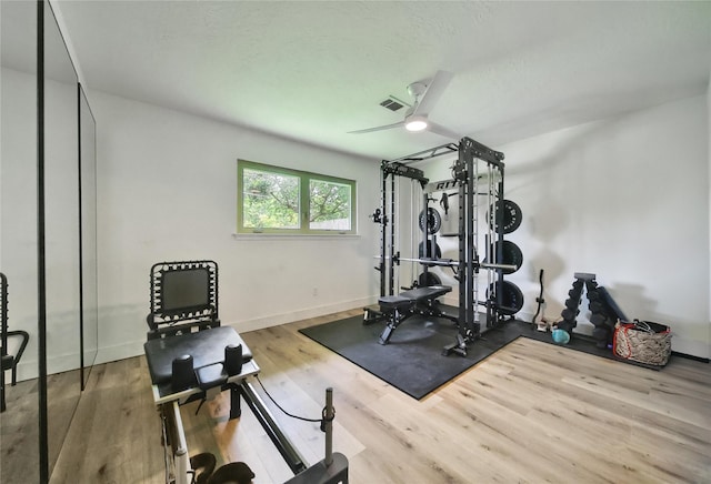 5503 Cheshire Ln, Houston, TX 77092 - workout room with a ceiling fan and wood finished floors