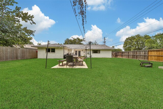 5503 Cheshire Ln, Houston, TX 77092 - rear view of house with a fenced backyard and a patio area