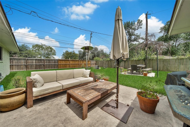 5503 Cheshire Ln, Houston, TX 77092 - fenced backyard with an outdoor hangout area, a patio area, and grilling area