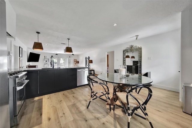 5503 Cheshire Ln, Houston, TX 77092 - dining space featuring light wood-type flooring and baseboards
