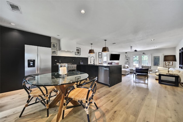 5503 Cheshire Ln, Houston, TX 77092 - dining space featuring light wood-style floors and recessed lighting