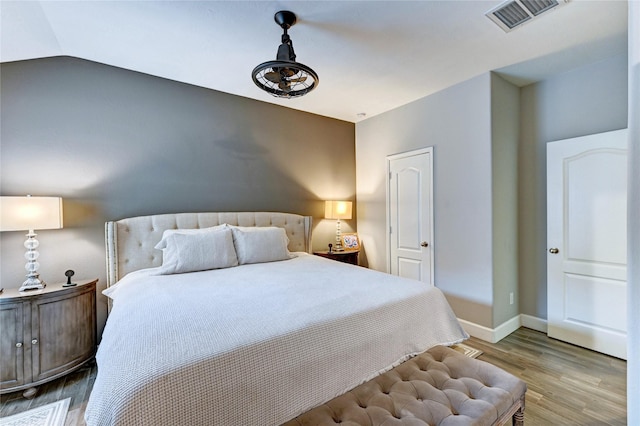 5311 Persimmon Pass, Richmond, TX 77407 - bedroom featuring wood finished floors and baseboards