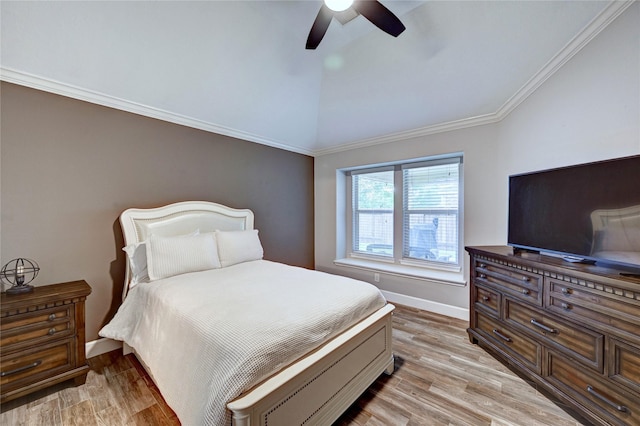 5311 Persimmon Pass, Richmond, TX 77407 - bedroom featuring lofted ceiling, light wood-style flooring, a ceiling fan, and ornamental molding