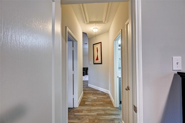 5311 Persimmon Pass, Richmond, TX 77407 - hallway featuring attic access and wood finished floors