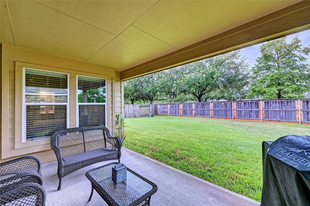 5311 Persimmon Pass, Richmond, TX 77407 - fenced backyard featuring a patio area and an outdoor living space