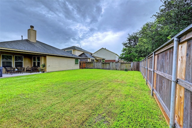 5311 Persimmon Pass, Richmond, TX 77407 - fenced backyard featuring a patio