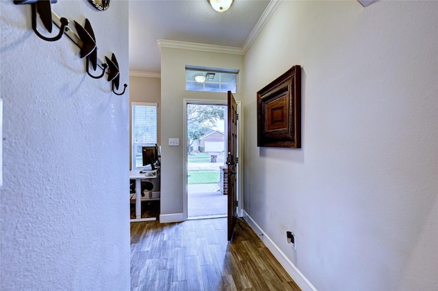 5311 Persimmon Pass, Richmond, TX 77407 - entryway with dark wood-type flooring and ornamental molding