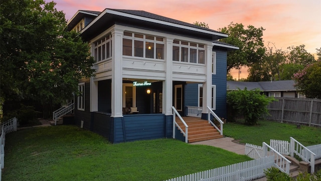 501 Branch St, Taylor, TX 76574 - greek revival house featuring stairs and a fenced backyard