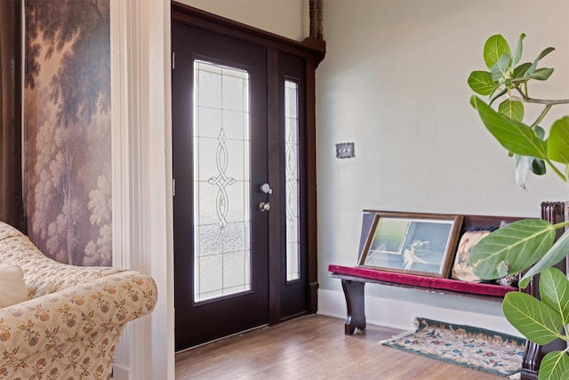 501 Branch St, Taylor, TX 76574 - entryway featuring wood finished floors and baseboards