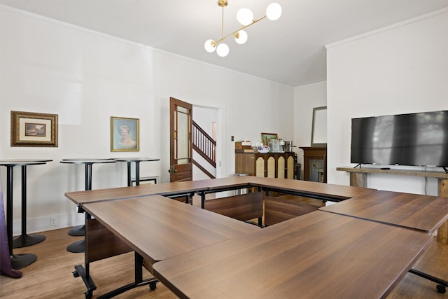 501 Branch St, Taylor, TX 76574 - dining room with crown molding, wood finished floors, and stairs