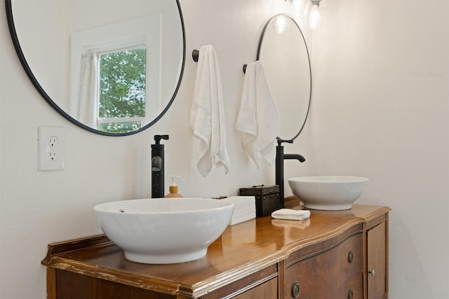 501 Branch St, Taylor, TX 76574 - bathroom featuring double vanity