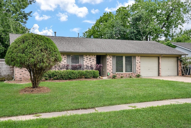 5815 Dryad Dr, Houston, TX 77035 - single story home featuring brick siding, a garage, concrete driveway, a front lawn, and roof with shingles