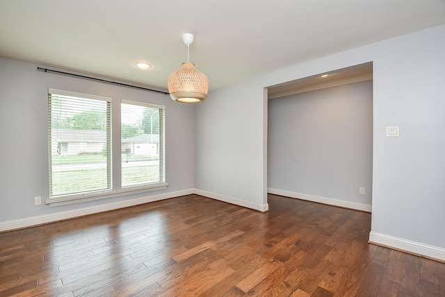 5815 Dryad Dr, Houston, TX 77035 - unfurnished room with dark wood-style flooring and recessed lighting
