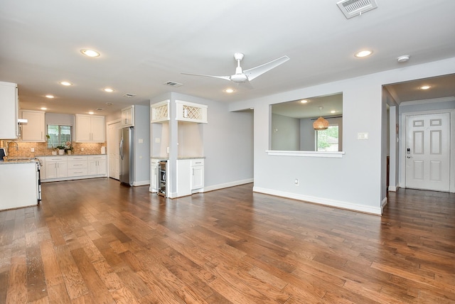 5815 Dryad Dr, Houston, TX 77035 - unfurnished living room with a ceiling fan, dark wood finished floors, and recessed lighting