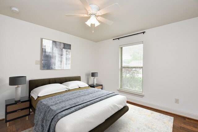 5815 Dryad Dr, Houston, TX 77035 - bedroom with wood finished floors and a ceiling fan