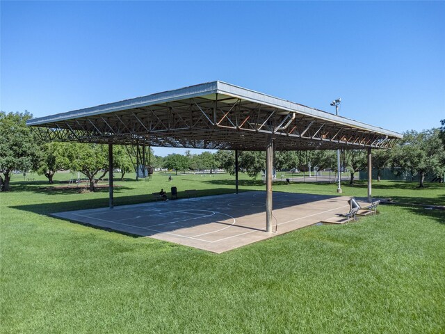 5815 Dryad Dr, Houston, TX 77035 - surrounding community featuring a yard, a carport, and community basketball court