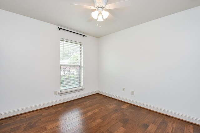 5815 Dryad Dr, Houston, TX 77035 - unfurnished room featuring dark wood-style flooring and a ceiling fan