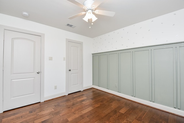5815 Dryad Dr, Houston, TX 77035 - unfurnished bedroom with dark wood-type flooring and ceiling fan