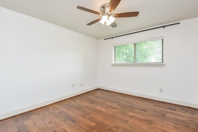 5815 Dryad Dr, Houston, TX 77035 - empty room with wood finished floors and a ceiling fan