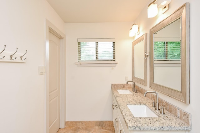 5815 Dryad Dr, Houston, TX 77035 - full bath featuring double vanity and tile patterned flooring