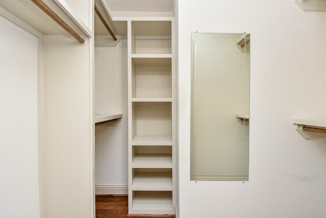 5815 Dryad Dr, Houston, TX 77035 - spacious closet featuring wood finished floors
