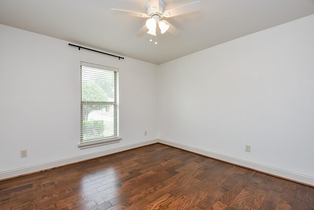 5815 Dryad Dr, Houston, TX 77035 - empty room with dark wood-type flooring and ceiling fan