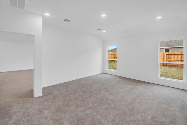 5214 Lake Trout Ln, Baytown, TX 77521 - carpeted empty room with recessed lighting