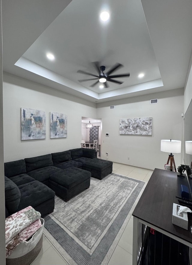 3237 Zircon Dr, Edinburg, TX 78541 - living area with a tray ceiling, ceiling fan, recessed lighting, and tile patterned flooring