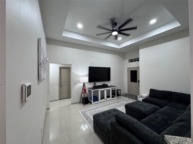 3237 Zircon Dr, Edinburg, TX 78541 - living area featuring ceiling fan, a tray ceiling, light tile patterned floors, and recessed lighting