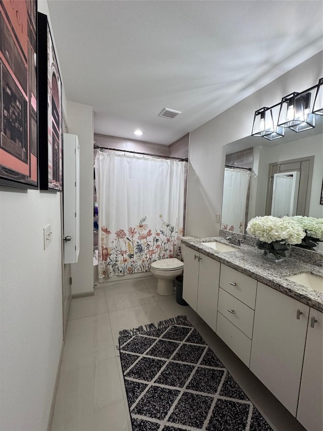 3237 Zircon Dr, Edinburg, TX 78541 - full bathroom featuring double vanity, shower / bathtub combination with curtain, recessed lighting, and tile patterned floors