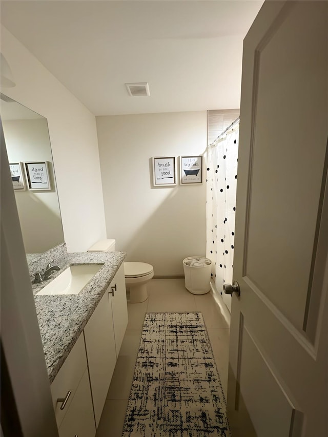 3237 Zircon Dr, Edinburg, TX 78541 - bathroom with vanity and tile patterned flooring