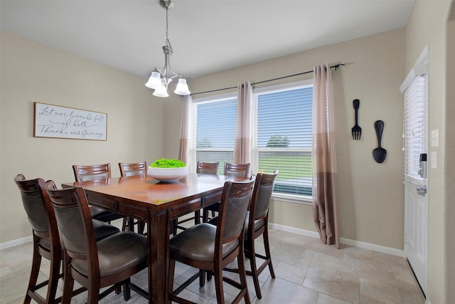 7518 Tejas Lakes Trl, Needville, TX 77461 - dining space with healthy amount of natural light and a chandelier