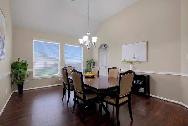 7518 Tejas Lakes Trl, Needville, TX 77461 - dining room featuring a chandelier, lofted ceiling, and dark wood finished floors