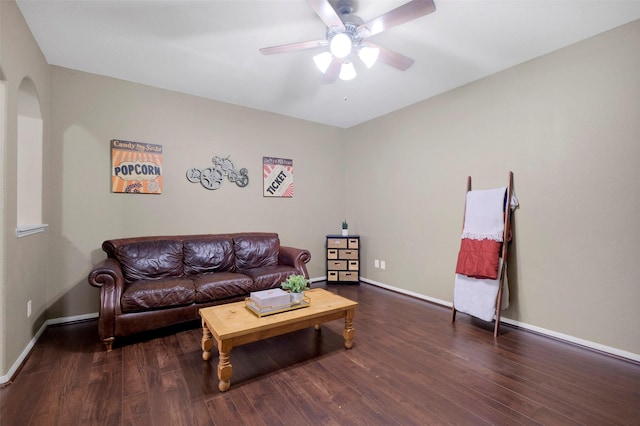 7518 Tejas Lakes Trl, Needville, TX 77461 - living area with ceiling fan, wood finished floors, and arched walkways