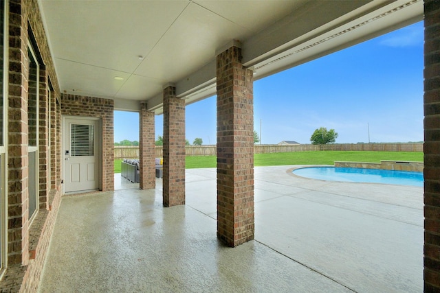 7518 Tejas Lakes Trl, Needville, TX 77461 - fenced backyard featuring a patio area