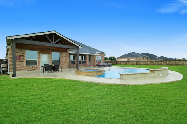 7518 Tejas Lakes Trl, Needville, TX 77461 - view of swimming pool with a patio, a fenced backyard, a pool with connected hot tub, and ceiling fan