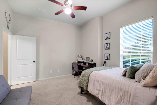 7518 Tejas Lakes Trl, Needville, TX 77461 - carpeted bedroom with a ceiling fan and a desk