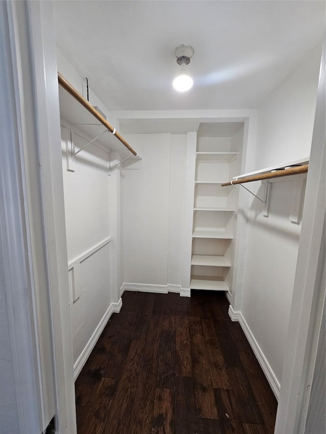 9207 Dairy View Ln, Houston, TX 77099 - spacious closet with dark wood finished floors
