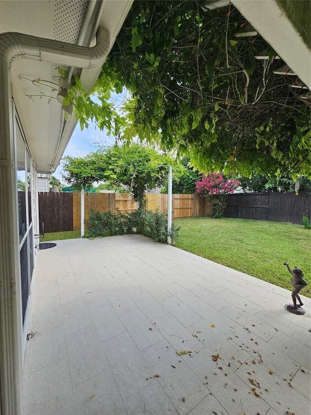 9207 Dairy View Ln, Houston, TX 77099 - fenced backyard featuring a patio area