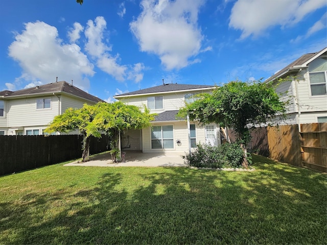 9207 Dairy View Ln, Houston, TX 77099 - back of property featuring a patio area and a fenced backyard