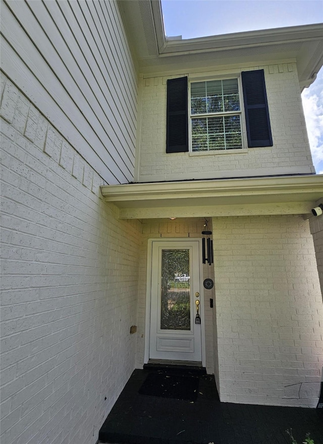 9207 Dairy View Ln, Houston, TX 77099 - doorway to property with brick siding
