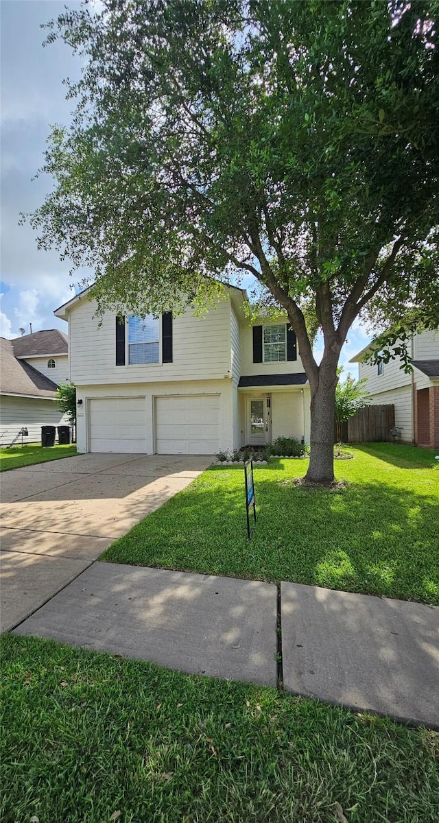 9207 Dairy View Ln, Houston, TX 77099 - traditional home with an attached garage and concrete driveway