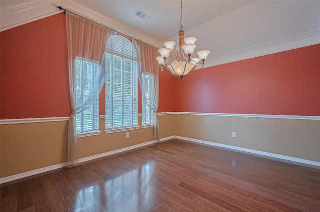 14610 Sandler Ct, Cypress, TX 77429 - empty room featuring plenty of natural light, a chandelier, wood finished floors, and ornamental molding