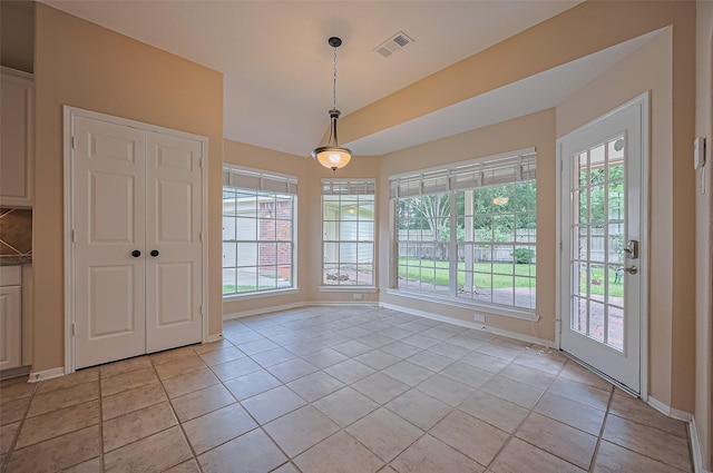 14610 Sandler Ct, Cypress, TX 77429 - unfurnished dining area with light tile patterned floors and lofted ceiling