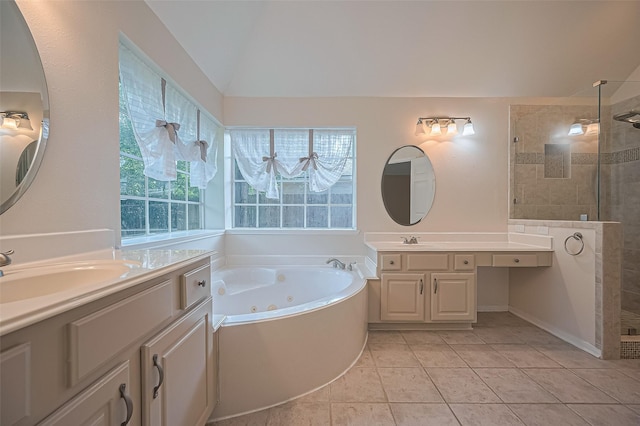 14610 Sandler Ct, Cypress, TX 77429 - bathroom with a shower stall, a jetted tub, two vanities, tile patterned floors, and vaulted ceiling