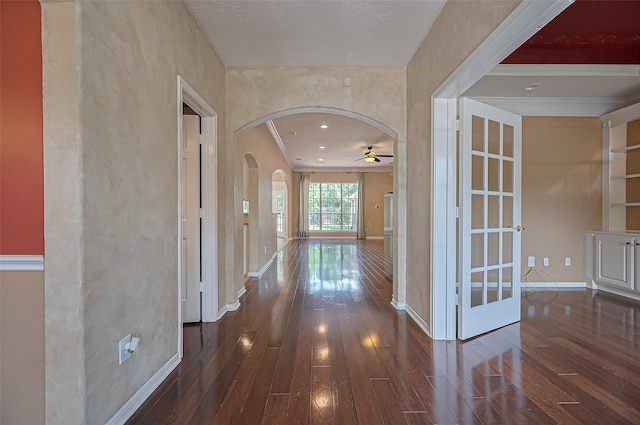 14610 Sandler Ct, Cypress, TX 77429 - hallway featuring hardwood / wood-style flooring, arched walkways, and crown molding