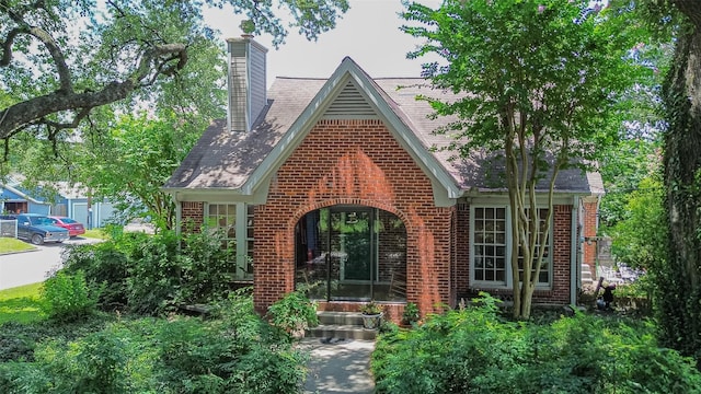 501 Gale St, Houston, TX 77009 - view of front of house featuring brick siding and a chimney