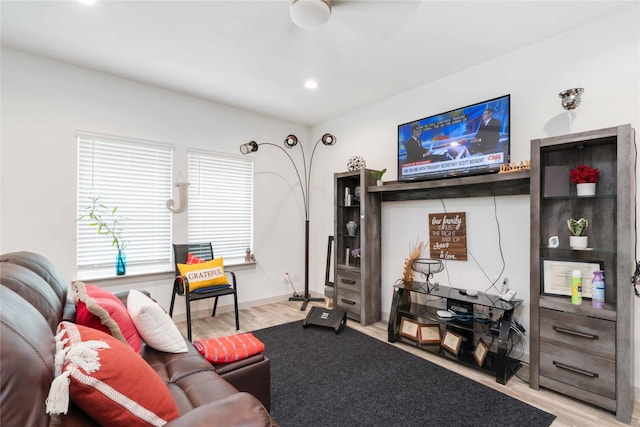 7730 Robert Ln, Rosharon, TX 77583 - living room featuring wood finished floors and recessed lighting