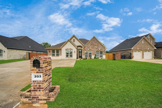 203 Pinedale Ave, Arcola, TX 77583 - french provincial home featuring brick siding and driveway