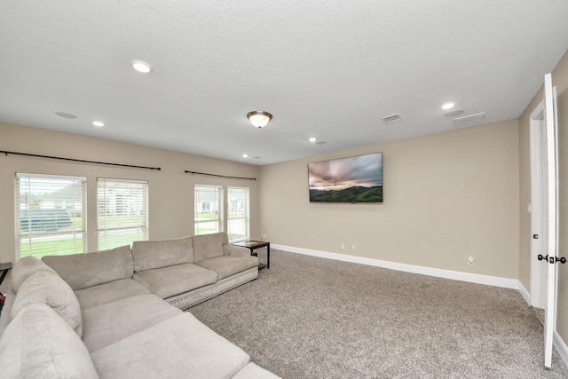 203 Pinedale Ave, Arcola, TX 77583 - living area with carpet flooring and recessed lighting